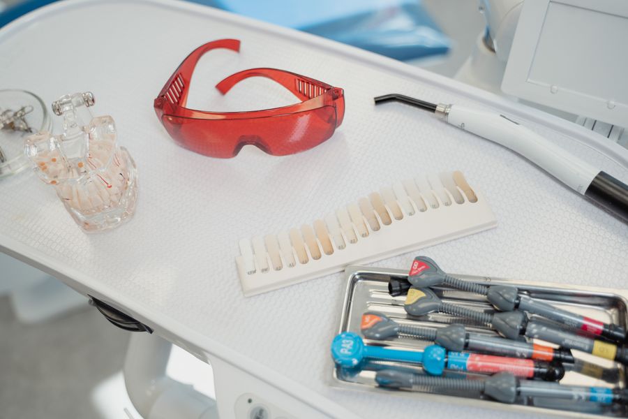 Dental instruments on a white tray