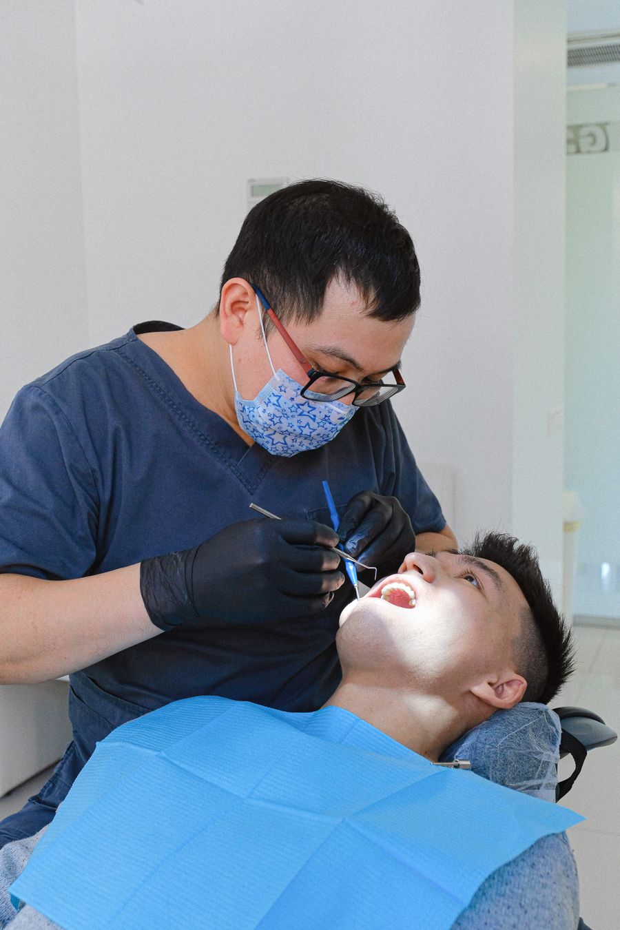 Dentist examining a patient